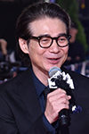 野田健治役